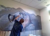 Muurschildering van Velsen Kappers aan het werk